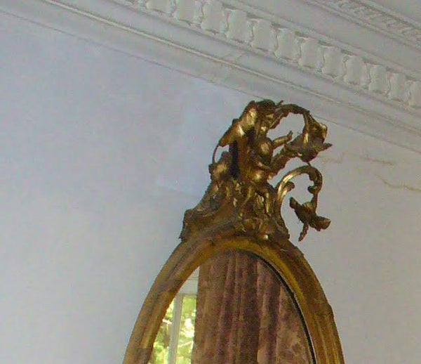 Fine Gilt Rococo Mirror with Elaborate Leafage Cupid Crest